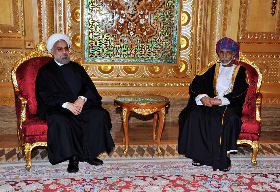 סולטן עומאן קאבוס בן סעיד עם נשיא איראן חסן רוחאני 2014 (צילום: AFP)