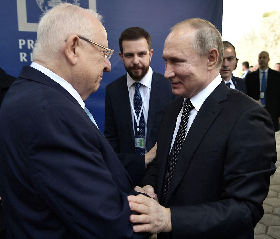 ראובן ריבלין עם נשיא רוסיה (צילום: AFP)