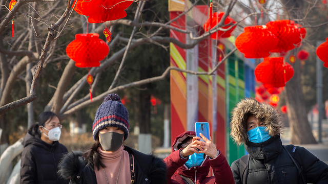 חגיגות השנה החדשה בסין בצל וירוס הקורונה (צילום: AP)