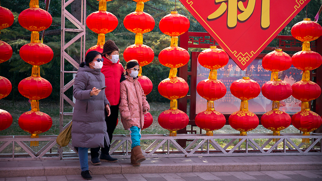 חגיגות השנה החדשה בסין בצל וירוס הקורונה (צילום: AP)