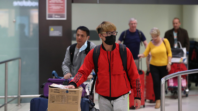 נוסעים טיסה שדה תעופה אוסטרליה נגיף וירוס קורונה ווהאן סין (צילום: gettyimages)
