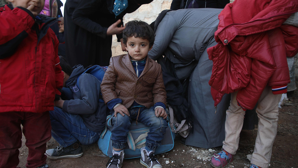 הפגנת תושבים מחוז אידליב סוריה (צילום: AFP)