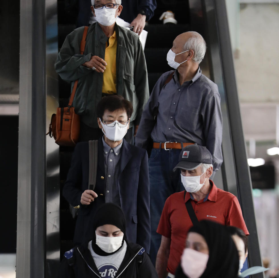 נמל תעופה בתאילנד נגיף מסכה וירוס קורונה (צילום: EPA)
