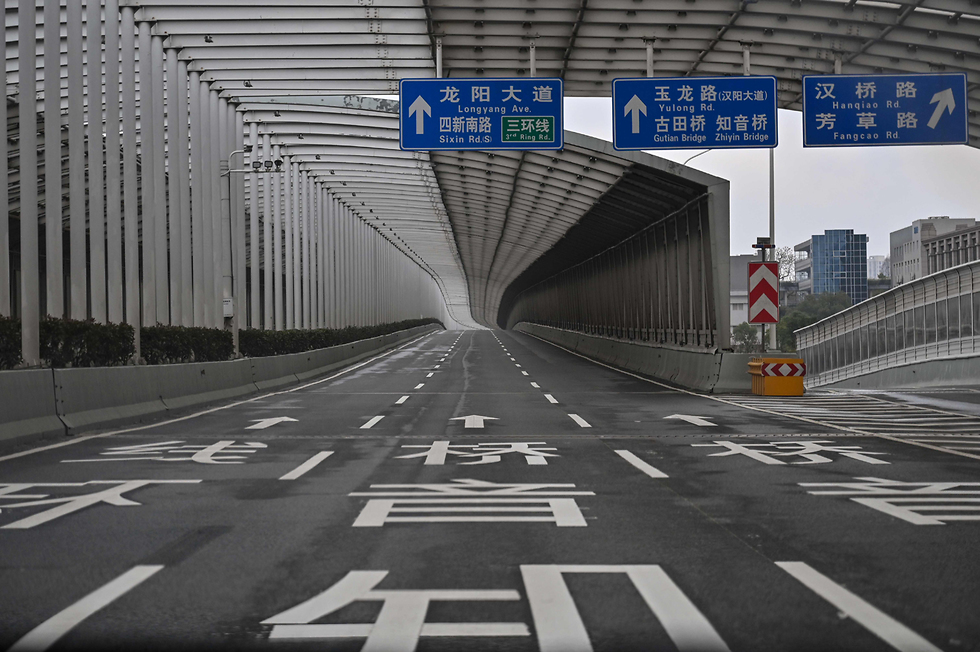 נגיף ה קורונה סין ערי רפאים כביש ווהאן  (צילום: AFP)