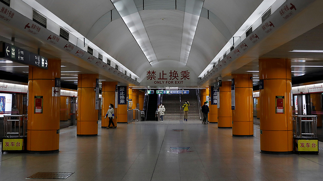 סין בייג'ינג חוזרים ל עבודה בצל נגיף קורונה רכבות ריקות (צילום: רויטרס)