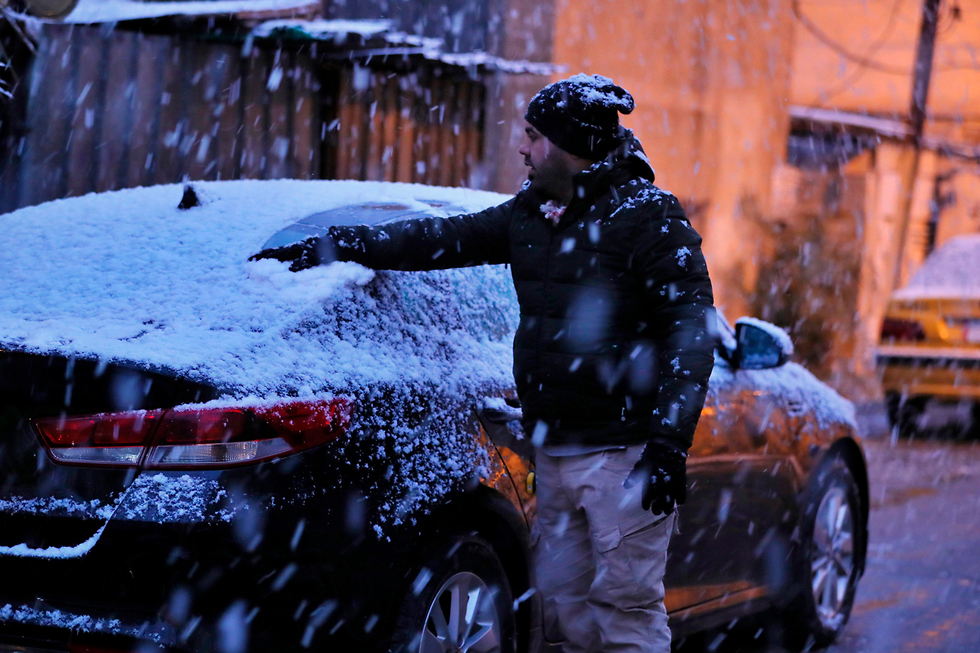 שלג ב עיראק בגדד (צילום: AP)