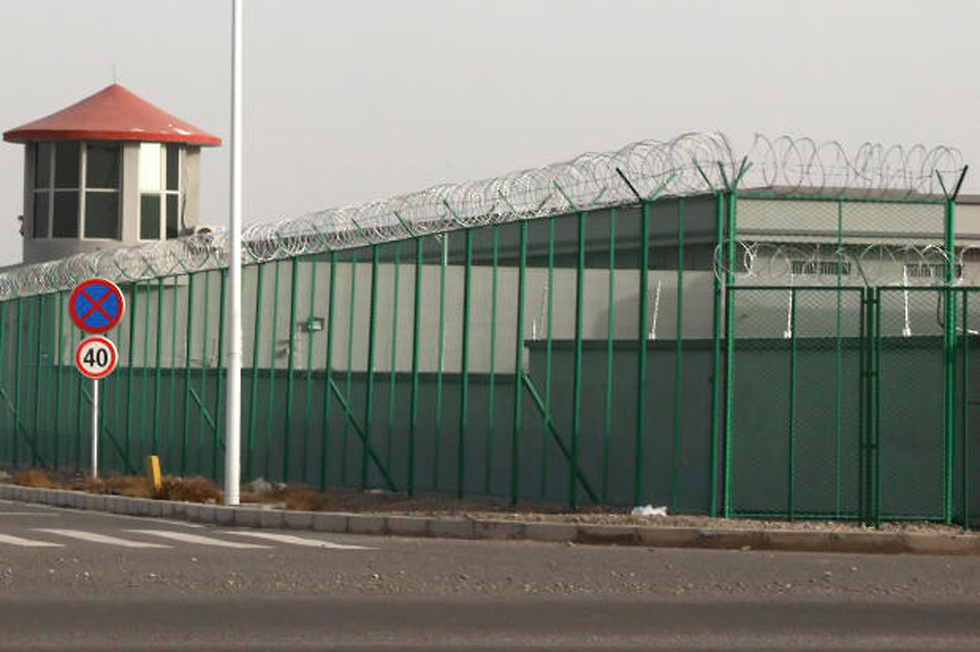 סין מעקב ו מעצר של מוסלמים בחבל שינג'יאנג (צילום: AP)