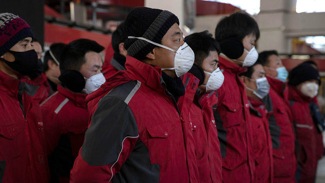 סין מסחר אלקטרוני חברת JD פועלים נגיף קורונה וירוס (צילום: AP)