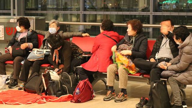 Южнокорейские туристы в аэропорту Бен-Гурион