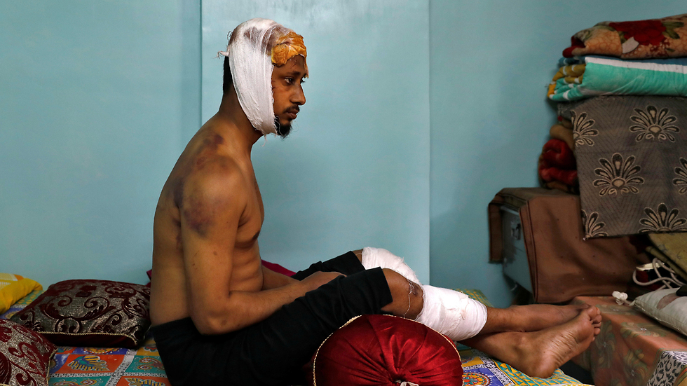 מוחמד זוביר  מוסלמי ב הודו שהותקף על-ידי המון ב ניו דלהי עימותים בין מוסלמים ל הינדים  (צילום: רויטרס)