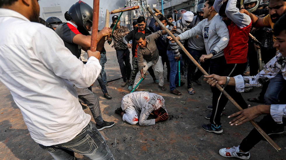 מוחמד זוביר  מוסלמי ב הודו שהותקף על-ידי המון ב ניו דלהי עימותים בין מוסלמים ל הינדים  (צילום: רויטרס)