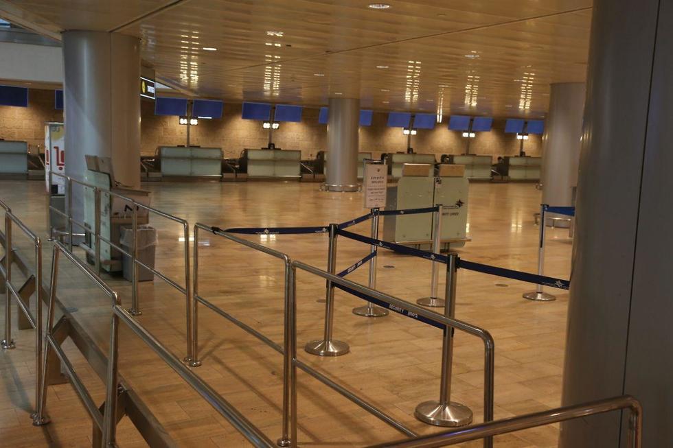Аэропорт Бен-Гурион пуст: полеты отменяются. Фото: Моти Кимхи (צילום: מוטי קמחי )