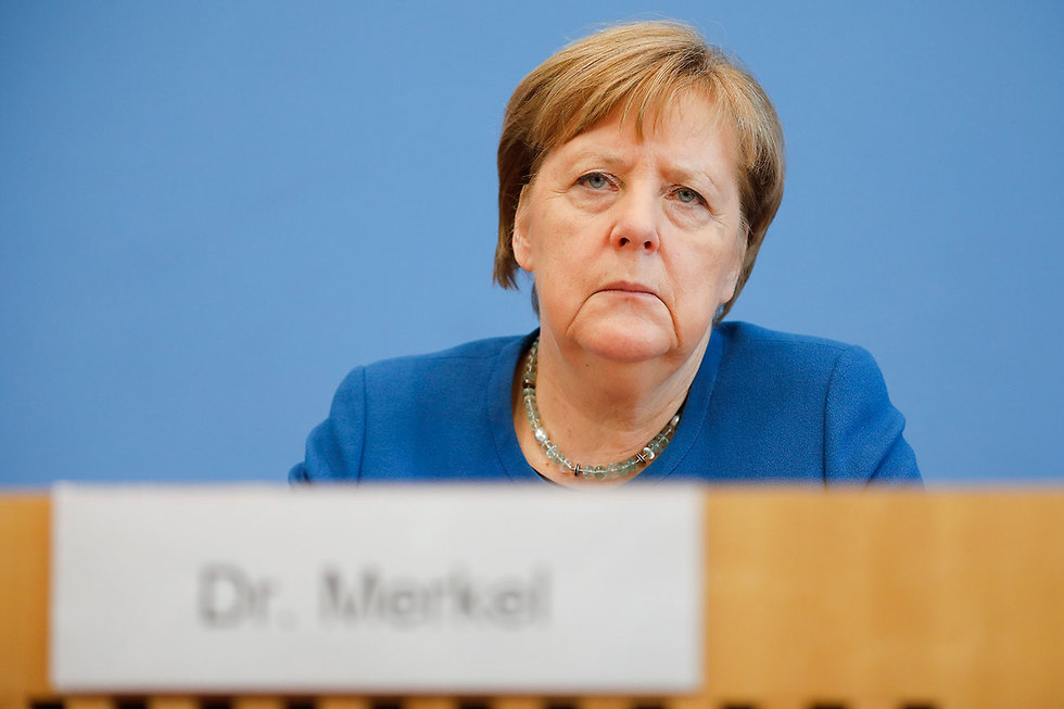 גרמניה נגיף קורונה מסיבת עיתונאים אנגלה מרקל (צילום: AP)