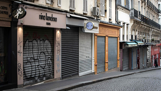 נגיף קורונה צרפת רחובות ריקים פריז (צילום: AFP)