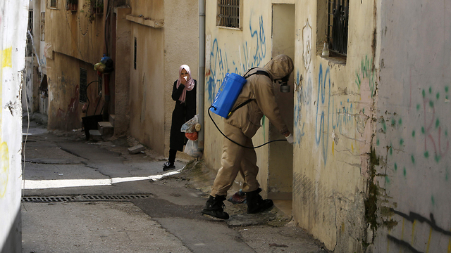 התפשטות הקורונה בקרב הפלסטינים (צילום: AFP)