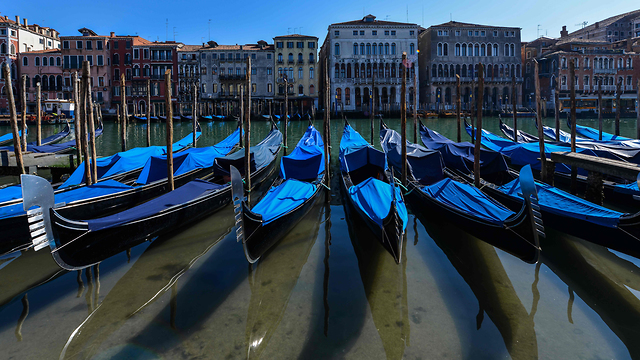 בעקבות הסגר הקורונה באיטליה: תעלות ונציה נקיות (צילום: AFP)