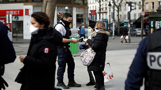 נגיף קורונה צרפת שוק פריז (צילום: AP)