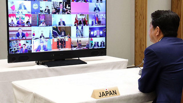 ועידת g20 בוידאו (צילום: FP PHOTO / JIJI PRESS / JAPAN'S CABINET PUBLIC RELATIONS OFFICE)