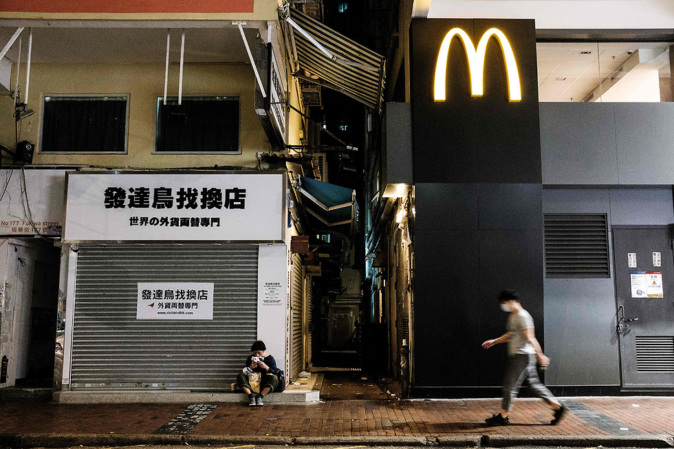 נגיף קורונה הונג קונג מקדונלדס חסרי בית לאונג בן 37 (צילום: AFP)