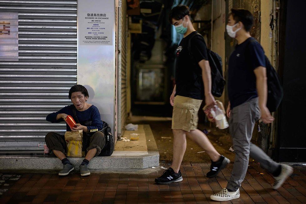 נגיף קורונה הונג קונג מקדונלדס חסרי בית לאונג בן 37 (צילום: AFP)