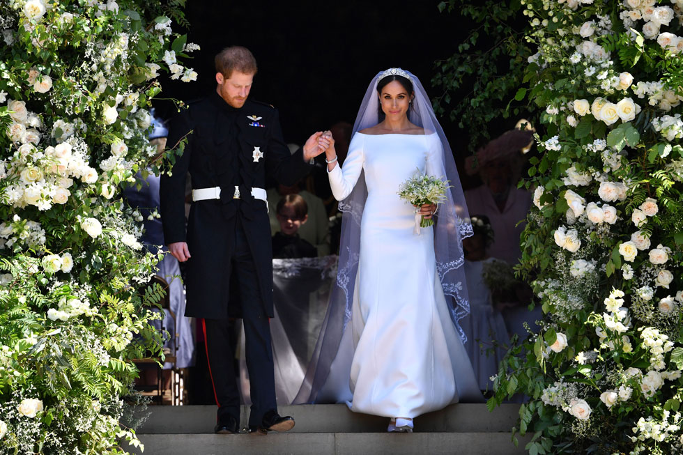 השמלה שכולם דיברו עליה. מייגן מרקל והנסיך הארי בחתונתם (צילום: Ben Stansall/GettyimagesIL)
