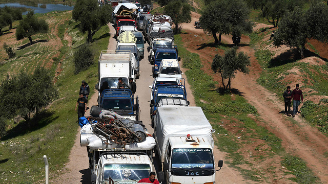 סוריה פליטים סורים בגבול טורקיה חוזרים לבתיהם מחוז חלב (צילום: AFP)