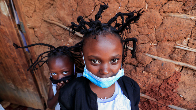 נגיף קורונה קניה ניירובי תסרוקת קורונה (צילום: רויטרס)