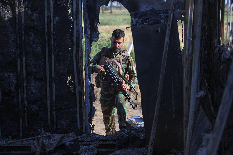 זירת פיגוע של דאעש מחוז סלאח א-דין עיראק (צילום: AFP)