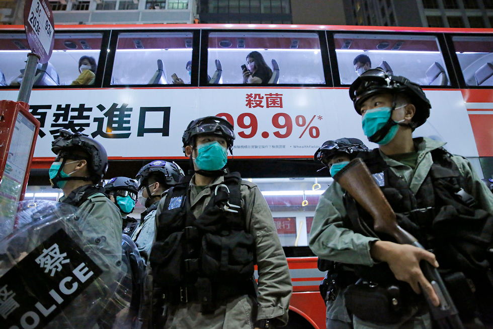 הפגנה ב הונג קונג ב-13 במאי נגד קארי לאם (צילום: AP)
