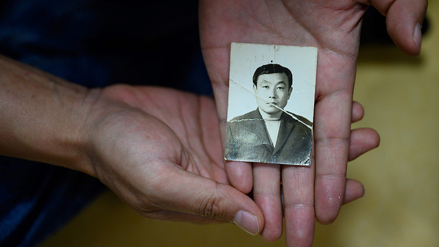 תמונת אחד הנעדרים מהטבח ב דרום קוריאה ב קוואנגג'ו ב-1980 (צילום: AFP)