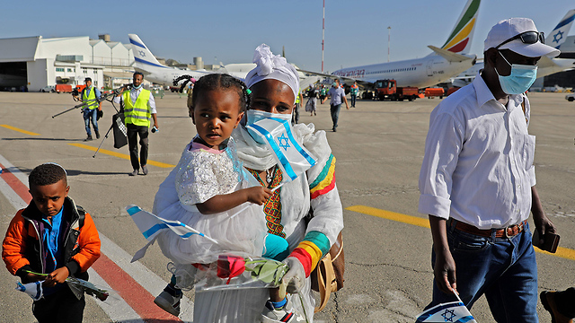  119 עולים חדשים מאתיופיה הגיעו לישראל בטיסה מיוחדת של הסוכנות היהודית (צילום: AFP)