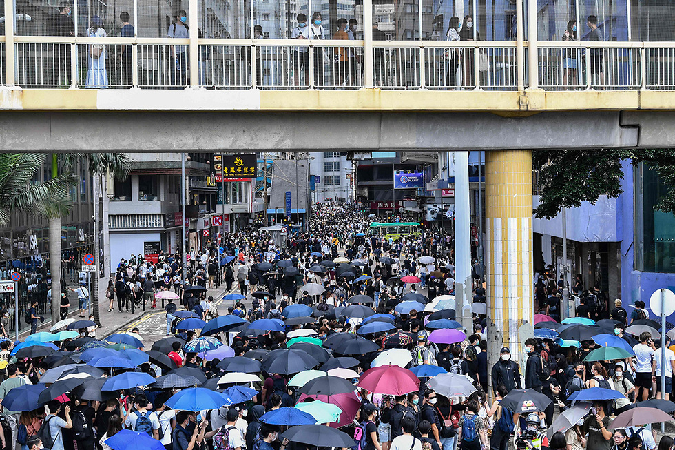 הונג קונג מחאה הפגנה מפגינים נגד חוק ביטחון סין (צילום: AFP)