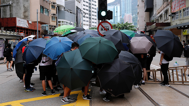 הונג קונג מחאה הפגנה מפגינים נגד חוק ביטחון סין (צילום: רויטרס)