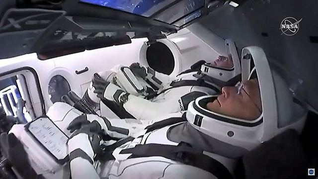 האסטרונאוטים ממתינים לשיגור בחללית (צילום: AFP)