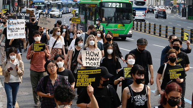 ג'ורג' פלויד מחאה עולמית סיאול דרום קוריאה הפגנה (צילום: רויטרס)