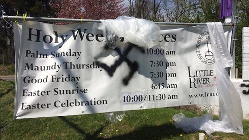 A swastika si daubed on a church notice in Virginia ()