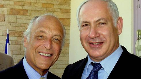 Benjamin Netanyahu, right, with his close friend Spencer Partridge in 2004  ()