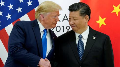 U.S. President Donald Trump and Chinese President Xi Jinping during a 2019 G20 meeting in Japan  ()
