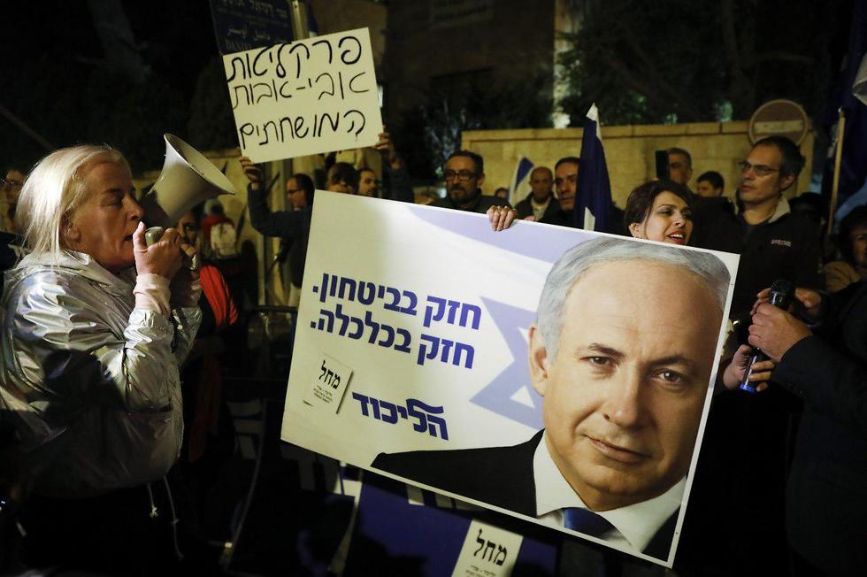 Supporters of Benjamin Netanyahu protest in Jerusalem after he was indicted Thursday  (Photo: AFP)