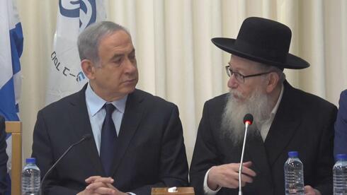 Prime Minister Benjamin Netanyahu and then-Health Minister Yaakov Litzman, Feb. 2020 (Photo: Shahar Goldstein) סיור של בנימין נתניהו, יעקב ליצמן ומאיר בן שבת לקראת קבלת חולי הקורונה הישראלים בבית החולים שיבא