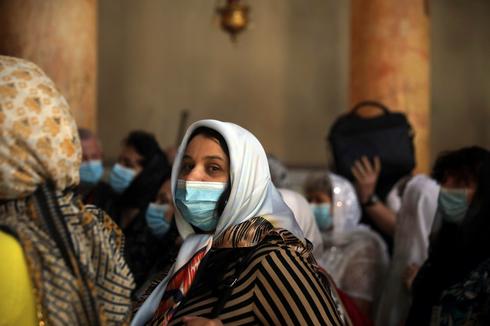 Жители Бейт-Лехема в защитных масках. Фото: AP (Photo: AP)