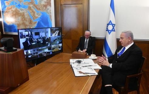 Prime Minister Benjamin Netanyahu hosts a cabinet meeting by teleconference  ()