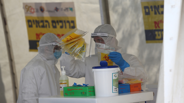 Drive-through coronavirus testing station in Jerusalem  (Photo: Alex Kolomoisky)