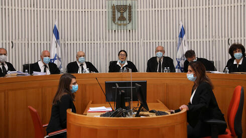 The panel of 11 judges  (Photo: EPA)