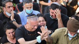 Family and friends attend the funeral of IDF soldier Amit Ben Yigal 