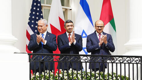 US President Donald J. Trump (L) speaks as (2L-R) Israeli Prime Minister Benjamin Netanyahu, Foreign Minister Sheikh Abdullah bin Zayed bin Sultan Al Nahyan and Foreign Minister Sheikh Khalid Bin Ahmed Al-Khalifa of Bahrain during the Abraham chords signing ceremony