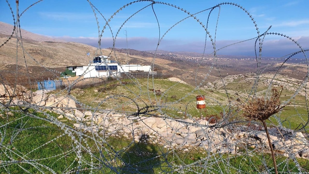 An enclave beyond the fence border Syria Syrian paratroopers barrel army