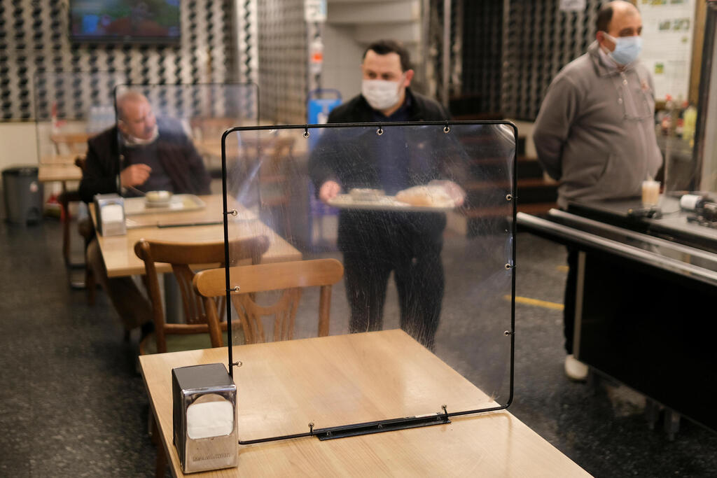 Partitions in a restaurant in Istanbul Turkey Corona