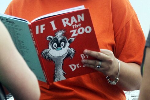 Courtney Keating, education coordinator at the Literacy Center in Evansville, Ind., Is reading 