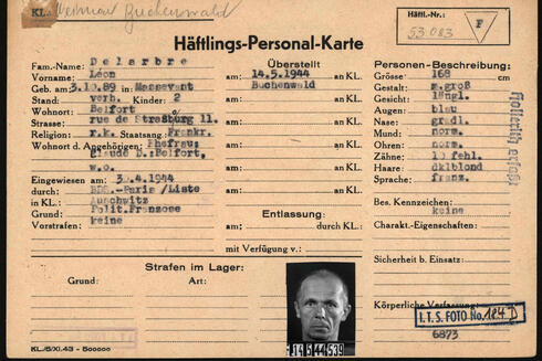 This reproduction provided on 22 March 2021 by the Arolsen Archives shows a prisoner card (Haeftlings-Personal-Karte) of the French Leon Delarbre held prison by the Nazis in the concentration camps of Auschwitz and Buchenwald